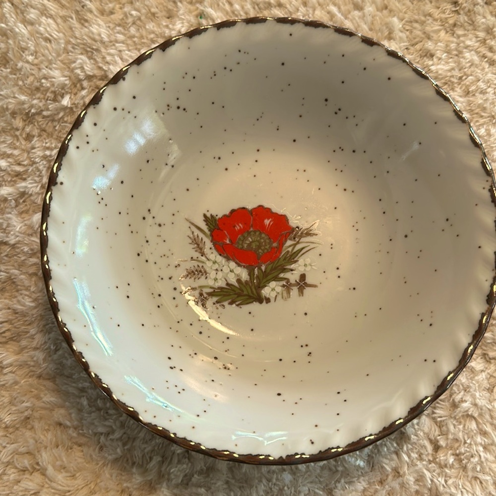 Japan otigiri red poppy bowl with brown specks.